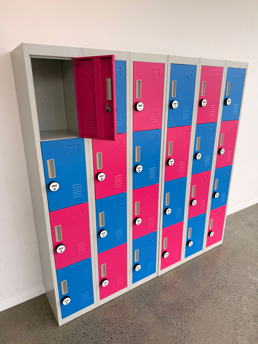 The locker bank with one door open, showing a single empty locker