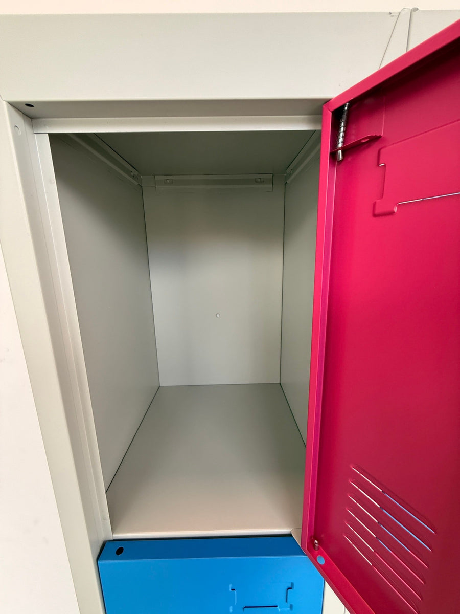 Inside an empty locker, showing the full depth and the rail across the top